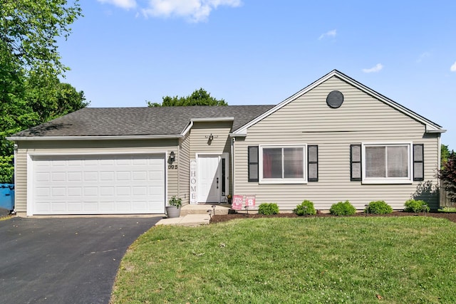 895 Fieldside Ln, Aurora, IL 60504 - ranch-style home featuring asphalt driveway, a front yard, an attached garage, and a shingled roof