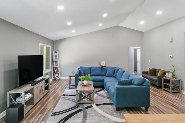895 Fieldside Ln, Aurora, IL 60504 - living room with light wood-style floors, lofted ceiling, and recessed lighting