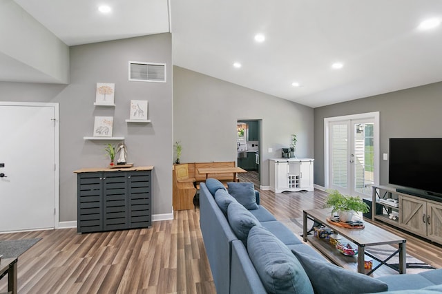 895 Fieldside Ln, Aurora, IL 60504 - living room with wood finished floors, recessed lighting, and high vaulted ceiling