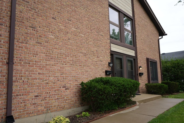 8234 Portsmouth Dr Unit D, Darien, IL 60561 - view of home's exterior with brick siding