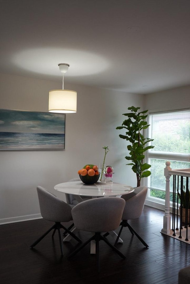 8234 Portsmouth Dr Unit D, Darien, IL 60561 - dining space with dark wood-style floors and baseboards