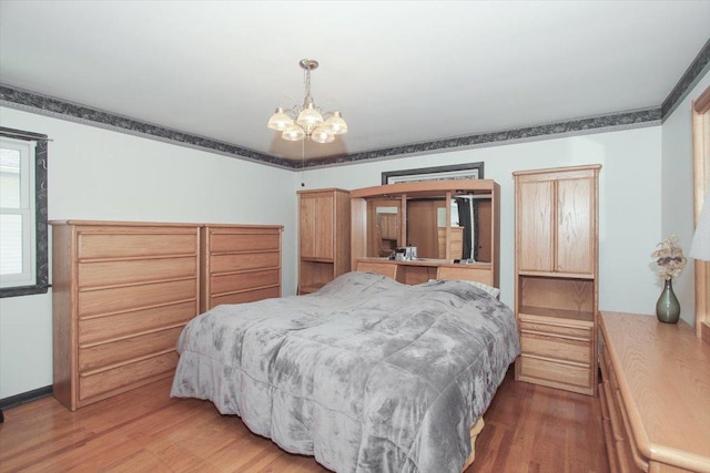 117 N Kenilworth Ave, Mount Prospect, IL 60056 - bedroom with a chandelier and wood finished floors