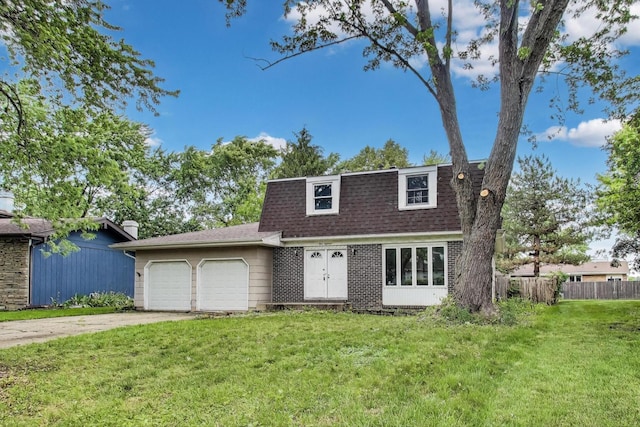 418 Surrey Ln, Lindenhurst, IL 60046 - dutch colonial with asphalt driveway, an attached garage, a front lawn, mansard roof, and a shingled roof
