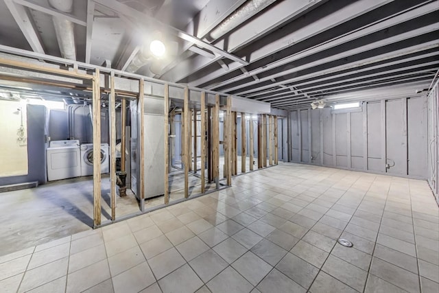 418 Surrey Ln, Lindenhurst, IL 60046 - unfinished below grade area featuring washer and dryer