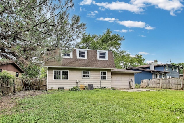 418 Surrey Ln, Lindenhurst, IL 60046 - rear view of property featuring a shingled roof and a fenced backyard