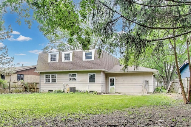 418 Surrey Ln, Lindenhurst, IL 60046 - rear view of property with roof with shingles and a fenced backyard