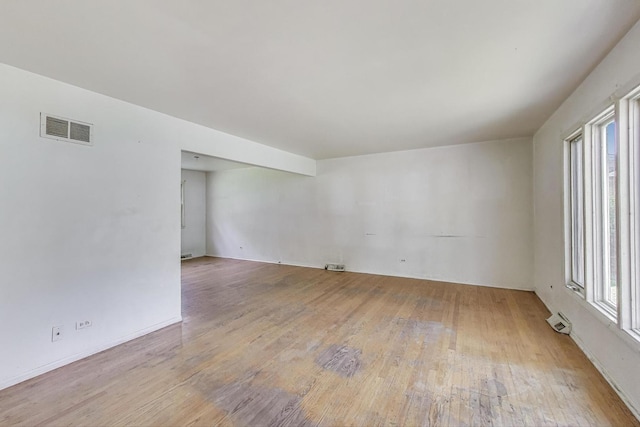 418 Surrey Ln, Lindenhurst, IL 60046 - spare room featuring wood finished floors and baseboards