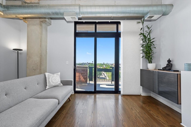 811 W 15th Pl Unit 709, Chicago, IL 60608 - living room featuring wood finished floors and baseboards