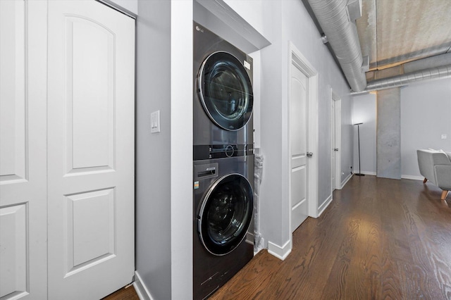 811 W 15th Pl Unit 709, Chicago, IL 60608 - laundry room with estacked washer and dryer and dark wood-style flooring
