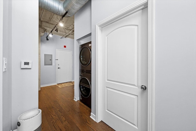 811 W 15th Pl Unit 709, Chicago, IL 60608 - hall with estacked washer and dryer, dark wood-style floors, electric panel, and track lighting