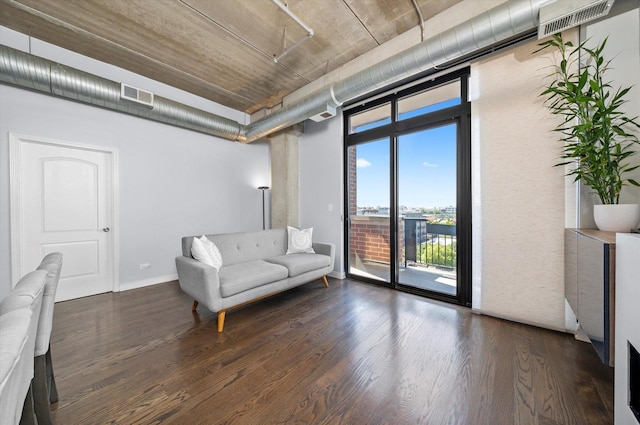 811 W 15th Pl Unit 709, Chicago, IL 60608 - living area featuring wood finished floors and a wall of windows