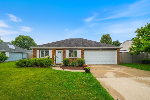 750 Shady Ln, Aurora, IL 60506 - view of front of property with brick siding, an attached garage, and driveway