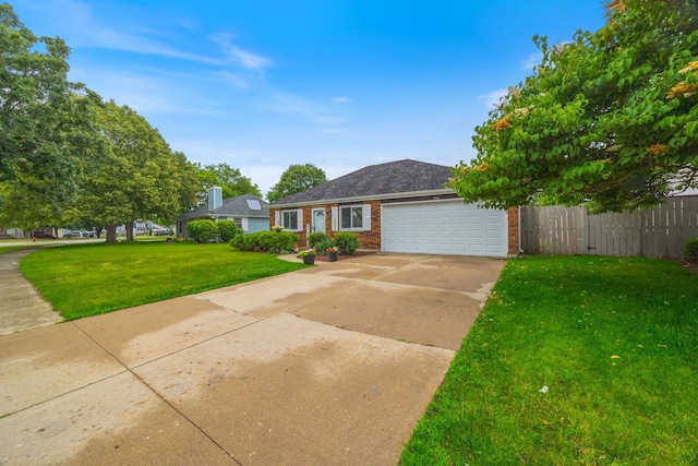 750 Shady Ln, Aurora, IL 60506 - single story home featuring a garage, brick siding, and concrete driveway