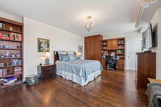 5000 S E End Ave Unit 18C, Chicago, IL 60615 - bedroom featuring a chandelier, a desk, and dark wood-style floors