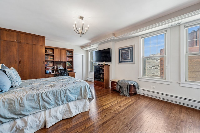 5000 S E End Ave Unit 18C, Chicago, IL 60615 - bedroom with dark wood finished floors, a chandelier, a baseboard heating unit, and an office area