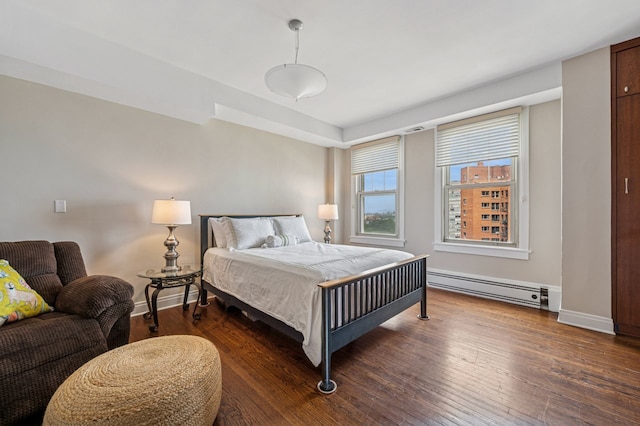 5000 S E End Ave Unit 18C, Chicago, IL 60615 - bedroom with a baseboard radiator and wood finished floors