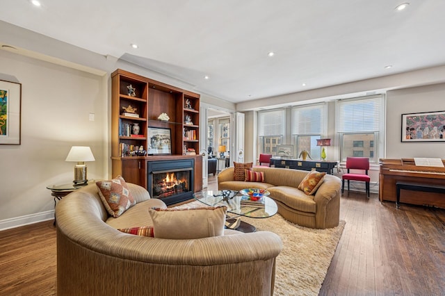 5000 S E End Ave Unit 18C, Chicago, IL 60615 - living room with a glass covered fireplace, hardwood / wood-style flooring, recessed lighting, and baseboard heating