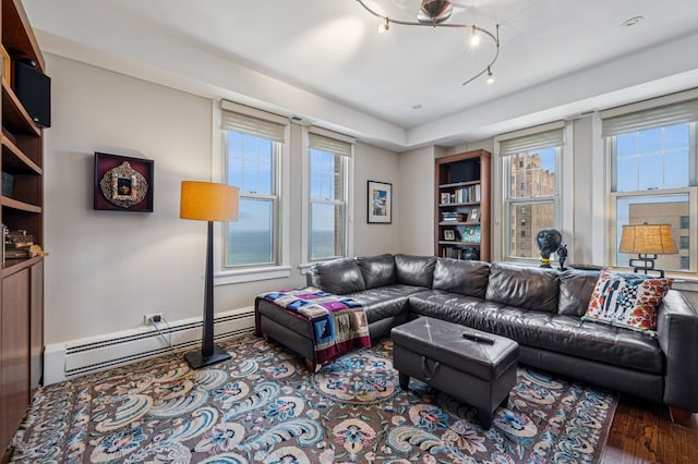 5000 S E End Ave Unit 18C, Chicago, IL 60615 - living area with a baseboard radiator and wood finished floors