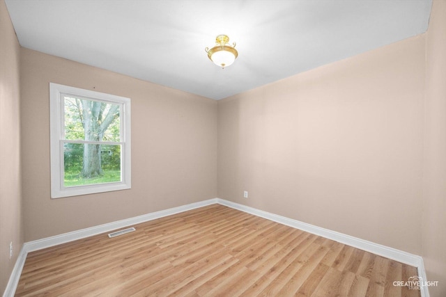 1806 E Sauk Trl, Sauk Village, IL 60411 - unfurnished room featuring light wood finished floors and baseboards