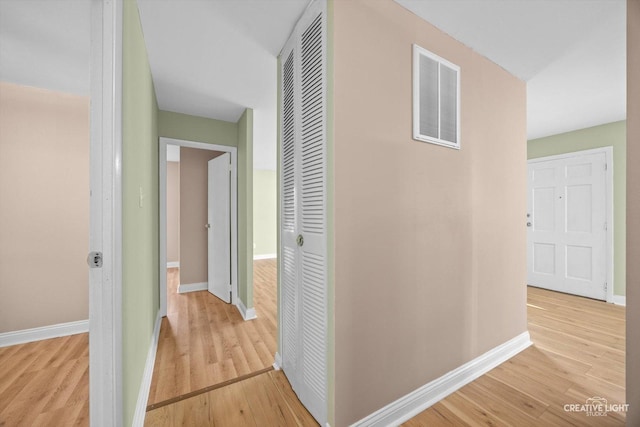 1806 E Sauk Trl, Sauk Village, IL 60411 - hall featuring light wood-style flooring and baseboards