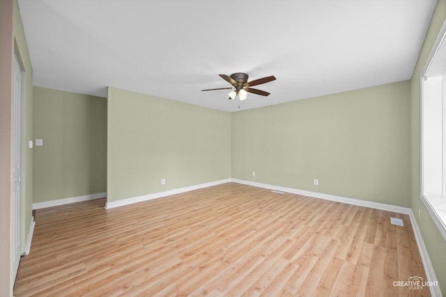 1806 E Sauk Trl, Sauk Village, IL 60411 - spare room featuring light wood-type flooring and a ceiling fan
