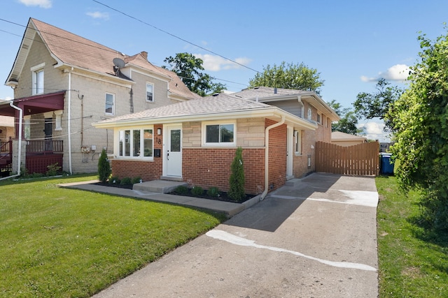 18 Orchard St, Hillside, IL 60162 - view of front facade with brick siding, driveway, and a shingled roof