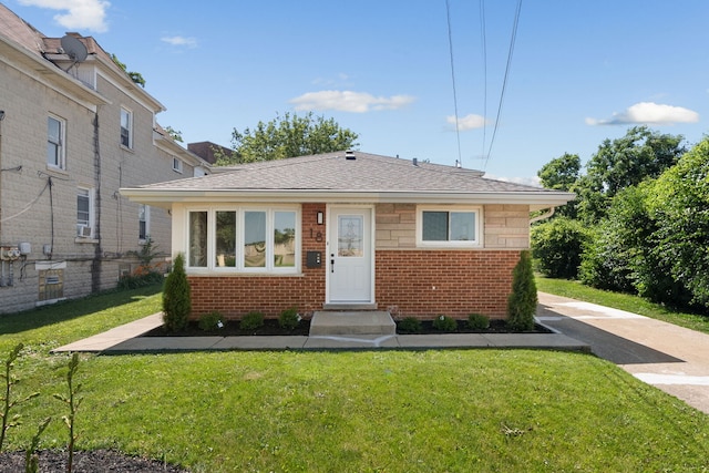 18 Orchard St, Hillside, IL 60162 - bungalow-style home with brick siding and roof with shingles