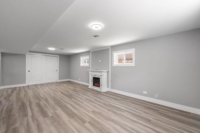 18 Orchard St, Hillside, IL 60162 - unfurnished living room with light wood-style floors and a premium fireplace