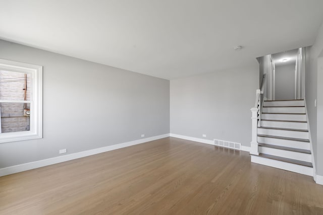 18 Orchard St, Hillside, IL 60162 - unfurnished living room with wood finished floors and stairs