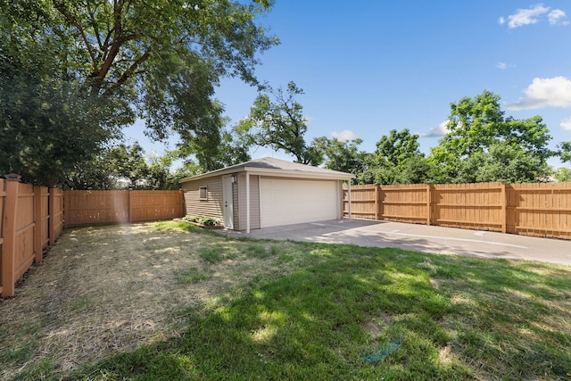 18 Orchard St, Hillside, IL 60162 - fenced backyard featuring an outdoor structure and a garage