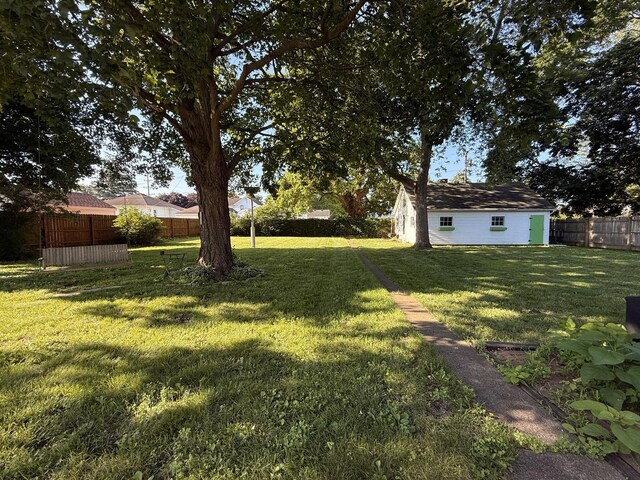 325 E Waupansie St, Dwight, IL 60420 - fenced backyard with an outdoor structure