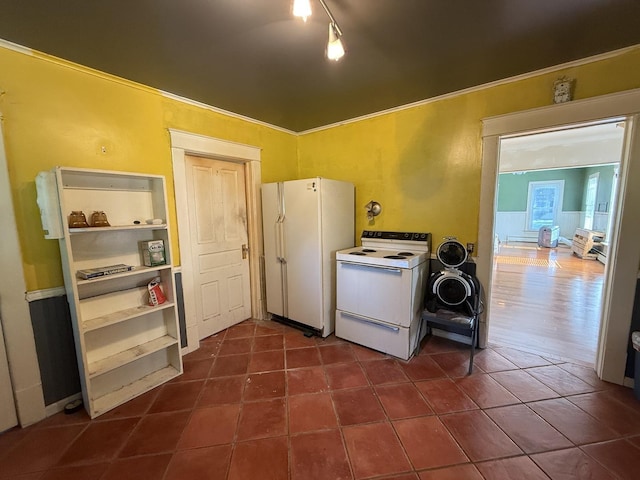 325 E Waupansie St, Dwight, IL 60420 - laundry room featuring dark tile patterned flooring and rail lighting