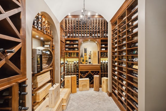 1414 N Mohawk St, Chicago, IL 60610 - wine cellar featuring a chandelier and brick flooring