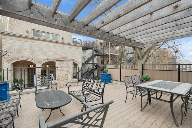 1414 N Mohawk St, Chicago, IL 60610 - wooden deck featuring a pergola and outdoor dining space