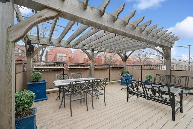 1414 N Mohawk St, Chicago, IL 60610 - wooden deck with outdoor dining space and a pergola