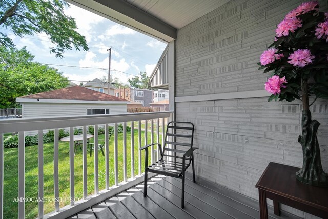 11402 S Calumet Ave, Chicago, IL 60628 - wooden terrace featuring a lawn