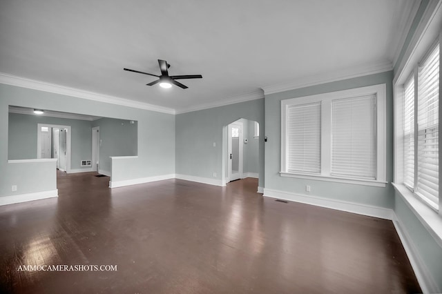 11402 S Calumet Ave, Chicago, IL 60628 - unfurnished living room with arched walkways, ceiling fan, ornamental molding, and dark wood-type flooring