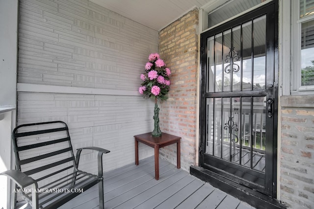 11402 S Calumet Ave, Chicago, IL 60628 - doorway to property with covered porch and brick siding