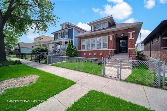 11402 S Calumet Ave, Chicago, IL 60628 - american foursquare style home featuring brick siding, a gate, and a fenced front yard