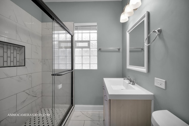 11402 S Calumet Ave, Chicago, IL 60628 - bathroom featuring a shower stall, vanity, and marble finish flooring