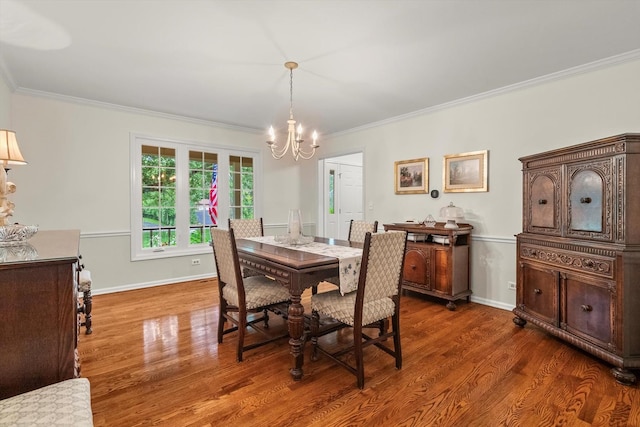 124 Hidden Oaks Dr, Barrington, IL 60010 - dining space featuring a chandelier, wood finished floors, and crown molding