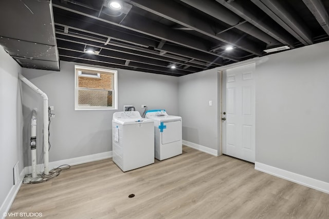 12830 S Carpenter St, Calumet Park, IL 60827 - laundry room with washing machine and dryer and wood finished floors