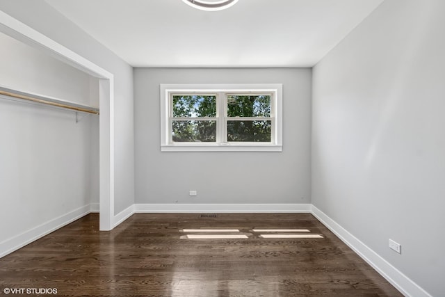 12830 S Carpenter St, Calumet Park, IL 60827 - unfurnished bedroom featuring a closet and wood finished floors