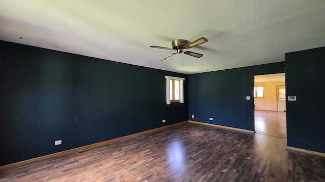 7121 Oak Grove Ave, Justice, IL 60458 - empty room featuring a ceiling fan and wood finished floors