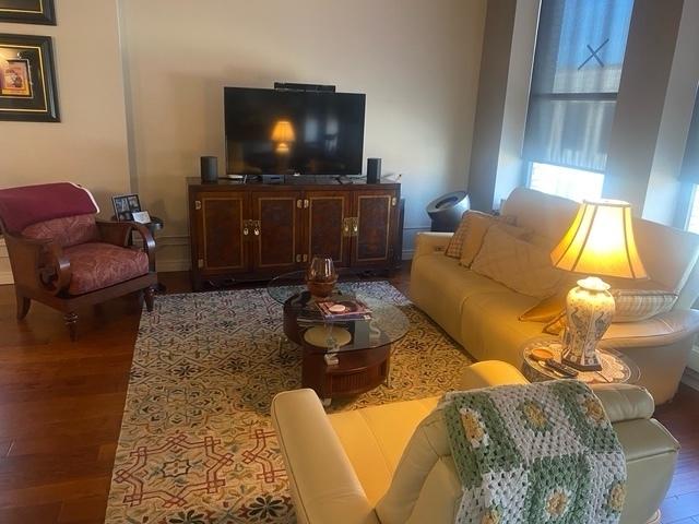 212 N Center St Unit 205, Bloomington, IL 61701 - living room with wood finished floors
