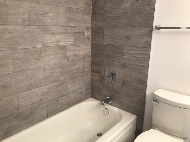 6340 Americana Dr Unit 705, Willowbrook, IL 60527 - bathroom featuring toilet and shower / bath combination