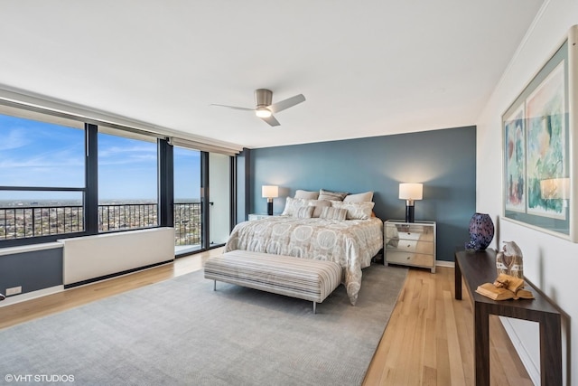 1560 N Sandburg Ter Unit 4301-4303, Chicago, IL 60610 - bedroom with light wood finished floors, access to exterior, and a ceiling fan
