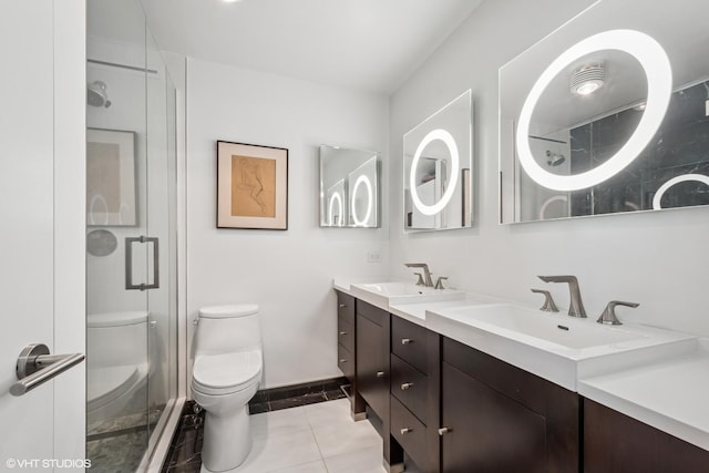1560 N Sandburg Ter Unit 4301-4303, Chicago, IL 60610 - bathroom featuring double vanity, a shower stall, and tile patterned flooring