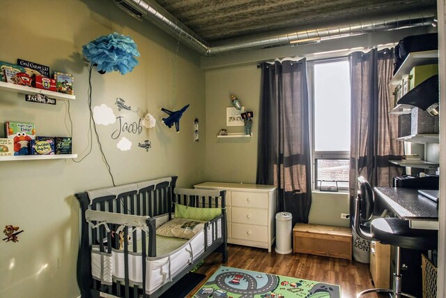 3201 W Leland Ave Unit 406, Chicago, IL 60625 - bedroom with dark wood-type flooring