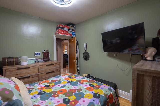 96 Interocean Ave, South Chicago Heights, IL 60411 - bedroom with arched walkways and wood finished floors